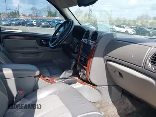 2004 GMC Envoy SLT with VIN 1GKET16S246160643, listed as a IAAI auction lot 41922915 with Not Provided miles and . Bid and sale history available at DreamBid. Image 5.