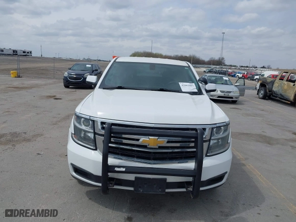 2020 Chevrolet Tahoe Commercial with VIN 1GNSKDEC9LR260983, listed as a IAAI auction lot 42062097 with 124,911 mi miles. Bid and sale history available at carsss.com. Image 12.