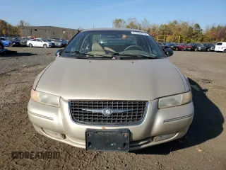 1999 Chrysler Cirrus LXi z VIN 1C3EJ56H1XN650261, wystawiony jako Copart lot #77095914 z przebiegiem 76 475 mil mil oraz Szkody całkowita. Historia ofert i sprzedaży dostępna na DreamBid. Obrazek 5.
