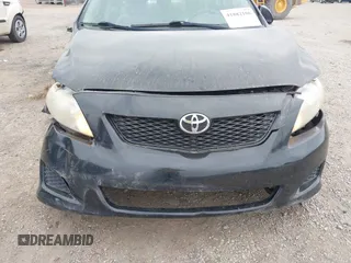 2009 Toyota Corolla with VIN 1NXBU40E69Z027673, listed as a IAAI auction lot 41882106 with 168,313 mi miles. Bid and sale history available at carsss.com. Image 12.