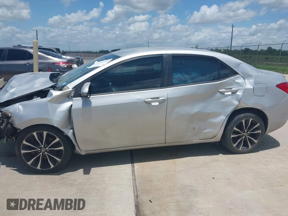 2017 Toyota Corolla L z VIN 5YFBURHE4HP732912, wystawiony jako IAAI lot #42451597 z przebiegiem 73 901 mil mil oraz . Historia ofert i sprzedaży dostępna na DreamBid. Obrazek 6.