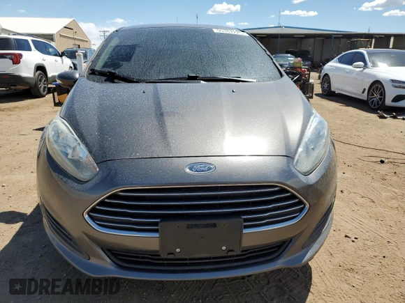 2016 Ford Fiesta SE with VIN 3FADP4BJ4GM127132, listed as a Copart auction lot 55107225 with 133,284 mi miles and Salvage Title. Bid and sale history available at DreamBid. Image 5.