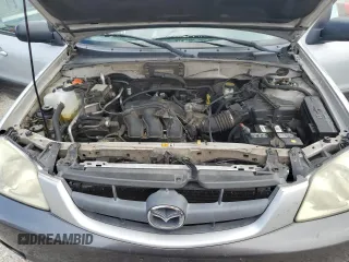 2004 Mazda Tribute ES with VIN 4F2CZ96104KM18818, listed as a Copart auction lot 68863884 with 317,983 mi miles and Salvage Title. Bid and sale history available at carsss.com. Image 11.