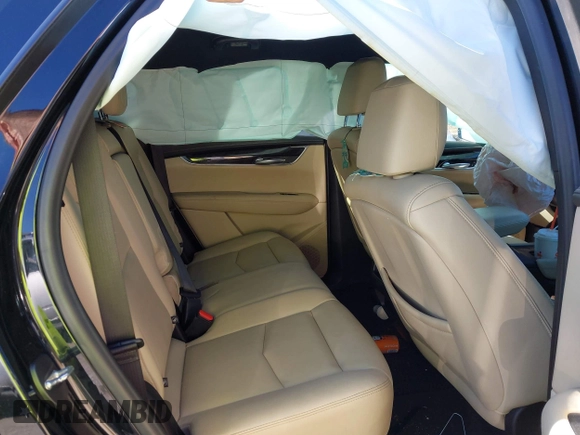 2018 Cadillac XT5 FWD with VIN 1GYKNARS5JZ235585, listed as a IAAI auction lot 41607440 with 77,220 mi miles and . Bid and sale history available at DreamBid. Image 8.