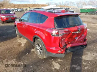 2016 Toyota RAV4 LE with VIN JTMBFREVXGJ100692, listed as a IAAI auction lot 41847333 with 130,822 mi miles. Bid and sale history available at carsss.com. Image 3.