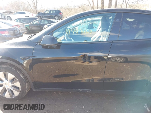 2024 Tesla Model Y with VIN 7SAYGDED5RF093018, listed as a IAAI auction lot 41747467 with 60,469 mi miles and . Bid and sale history available at DreamBid. Image 14.