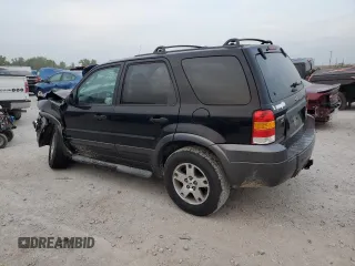 2005 Ford Escape XLT with VIN 1FMYU931X5KD14729, listed as a Copart auction lot 71127464 with 0 mi miles and Salvage Title. Bid and sale history available at carsss.com. Image 2.