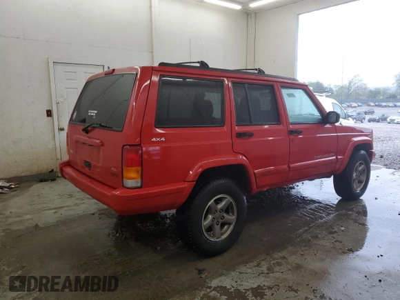 1998 Jeep Cherokee Sport with VIN 1J4FJ68S7WL148034, listed as a Copart auction lot 52436475 with 80,239 mi miles and Salvage Title. Bid and sale history available at carsss.com. Image 3.