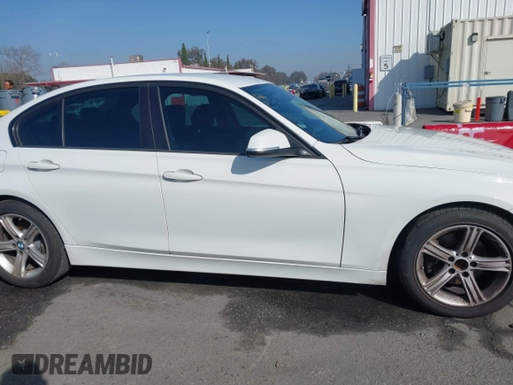 2014 BMW 3 Series 328i with VIN WBA3A5C52EJ463819, listed as a IAAI auction lot 41669717 with 111,112 mi miles. Bid and sale history available at carsss.com. Image 14.