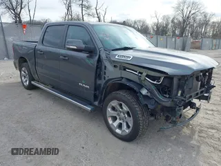 2022 Ram 1500 Big Horn with VIN 1C6SRFFT4NN381744, listed as a IAAI auction lot 41621744 with 48,414 mi miles and . Bid and sale history available at DreamBid. Image 1.