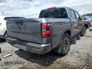 2024 Nissan Frontier SV z VIN 1N6ED1EJXRN648900, wystawiony jako Copart lot #56671275 z przebiegiem 10 471 mil mil oraz Nie do naprawy • Non repairable. Historia ofert i sprzedaży dostępna na DreamBid. Obrazek 3.