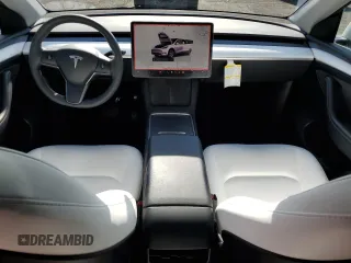 2023 Tesla Model Y Long Range with VIN 7SAYGDEE5PF831826, listed as a Copart auction lot 43752525 with 22,337 mi miles and Salvage Title. Bid and sale history available at DreamBid. Image 8.