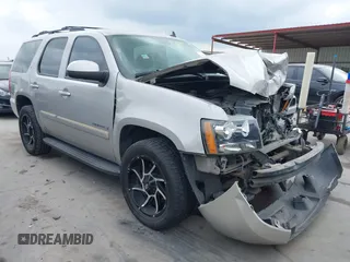 2007 Chevrolet Tahoe LTZ with VIN 1GNFC13057J404555, listed as a IAAI auction lot 41699339 with 256,325 mi miles and . Bid and sale history available at DreamBid. Image 1.