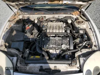 1997 Mitsubishi 3000GT GT z VIN JA3AM84J5VY003087, wystawiony jako Copart lot #86616564 z przebiegiem 212 249 mil mil oraz Szkoda całkowita • Salvage title. Historia ofert i sprzedaży dostępna na DreamBid. Obrazek 11.