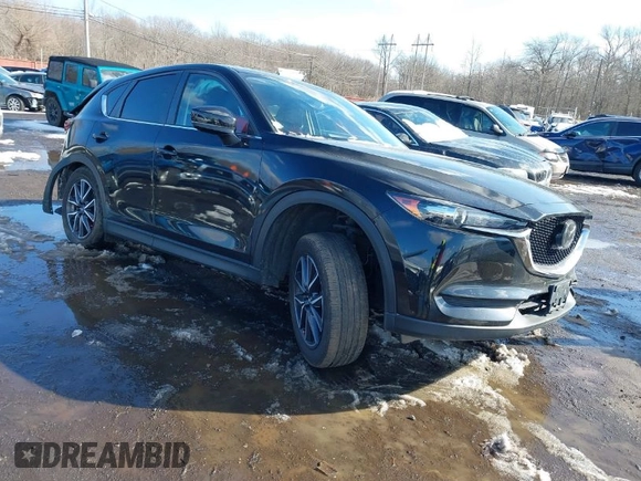 2018 Mazda CX-5 Touring with VIN JM3KFBCM2J0451828, listed as a IAAI auction lot 41531728 with 88,939 mi miles. Bid and sale history available at carsss.com. Image 1.