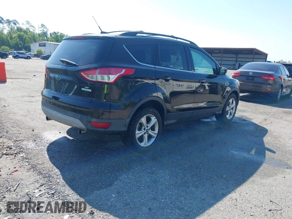 2013 Ford Escape SE with VIN 1FMCU0GX3DUA85432, listed as a IAAI auction lot 42018437 with Not Provided miles and . Bid and sale history available at DreamBid. Image 4.