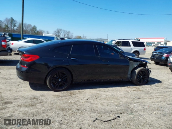 2018 BMW 6 Series 640i xDrive with VIN WBAJV6C5XJBK07708, listed as a IAAI auction lot 41784298 with 70,000 mi miles and . Bid and sale history available at carsss.com. Image 14.
