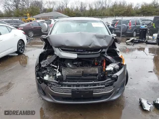 2013 Ford C-Max Hybrid SE with VIN 1FADP5AU2DL543064, listed as a IAAI auction lot 41721112 with 94,392 mi miles. Bid and sale history available at carsss.com. Image 13.