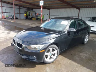 2015 BMW 3 Series 328i with VIN WBA3C1C53FK119723, listed as a IAAI auction lot 41871200 with 112,552 mi miles and . Bid and sale history available at carsss.com. Image 2.