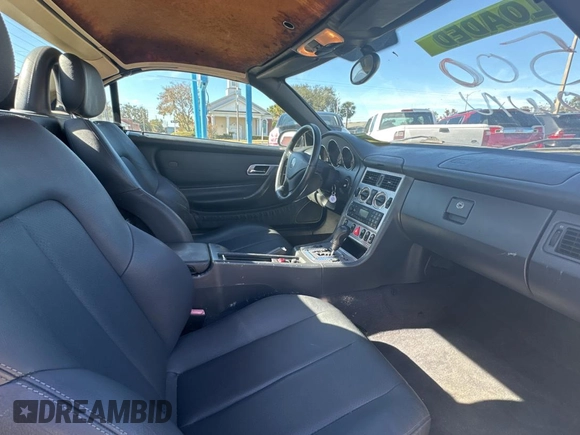 2002 Mercedes-Benz SLK-Class 2.3L Kompressor with VIN WDBKK49FX2F265220, listed as a Copart auction lot 84038354 with 90,860 mi miles and Clean Title. Bid and sale history available at carsss.com. Image 6.