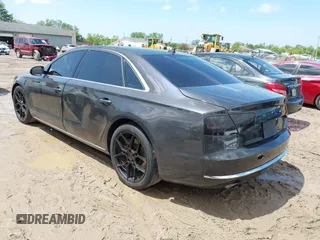 2011 Audi A8 с VIN WAURVAFDXBN020316, выставлен на аукционе IAAI как лот 42297622 с пробегом 156 881 миль миль и . История ставок и продаж доступна на DreamBid. Изображение 3.