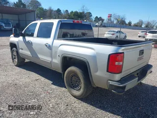 2015 GMC Sierra 1500 SLT with VIN 3GTU2VEJ8FG430051, listed as a IAAI auction lot 41208698 with 191,699 mi miles and . Bid and sale history available at DreamBid. Image 3.