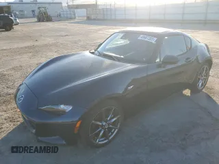 2021 Mazda MX-5 Miata Grand Touring with VIN JM1NDAM75M0456881, listed as a Copart auction lot 49667305 with 79,936 mi miles and Clean title. Bid and sale history available at DreamBid. Image 1.