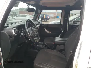 2015 Jeep Wrangler Unlimited Sahara z VIN 1C4BJWEG6FL627890, wystawiony jako Copart lot #58080945 z przebiegiem 145 941 mil mil oraz Szkoda całkowita • Salvage title. Historia ofert i sprzedaży dostępna na DreamBid. Obrazek 7.