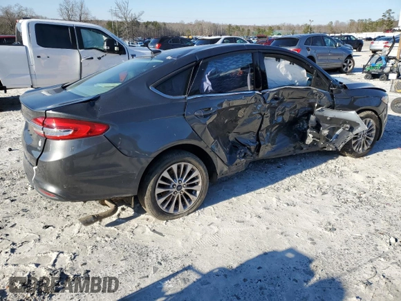 2017 Ford Fusion SE z VIN 3FA6P0H71HR150451, wystawiony jako Copart lot #46283505 z przebiegiem 148 702 mil mil oraz Szkoda całkowita • Salvage title. Historia ofert i sprzedaży dostępna na DreamBid. Obrazek 3.