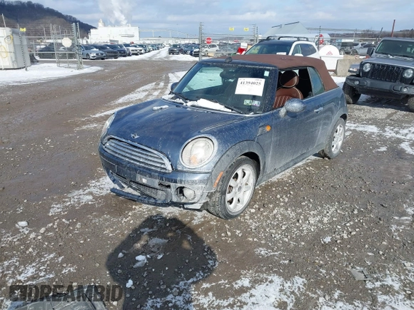 2010 MINI Convertible with VIN WMWMR3C50ATZ18845, listed as a IAAI auction lot 41394025 with 78,872 mi miles and . Bid and sale history available at DreamBid. Image 2.