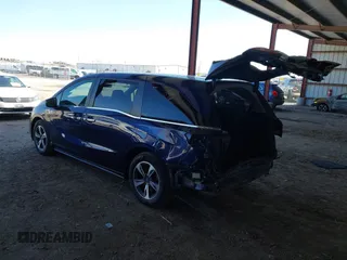 2020 Honda Odyssey Touring with VIN 5FNRL6H82LB015715, listed as a IAAI auction lot 41915849 with 69,603 mi miles and . Bid and sale history available at DreamBid. Image 3.