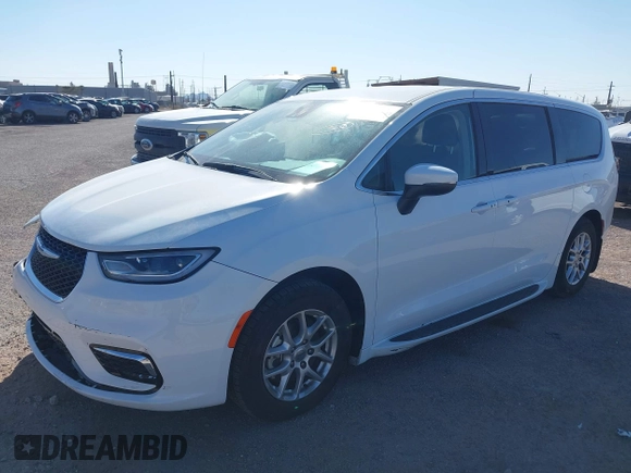 2023 Chrysler Pacifica Touring L with VIN 2C4RC1BG6PR531640, listed as a IAAI auction lot 42251680 with 31,638 mi miles and . Bid and sale history available at DreamBid. Image 17.