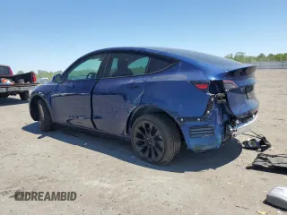 2022 Tesla Model Y Long Range z VIN 7SAYGDEEXNF444122, wystawiony jako Copart lot #54344735 z przebiegiem 33 230 mil mil oraz Szkody całkowita. Historia ofert i sprzedaży dostępna na DreamBid. Obrazek 2.