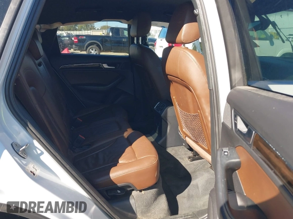 2014 Audi Q5 Premium z VIN WA1CFAFP0EA061818, wystawiony jako IAAI lot #40845361 z przebiegiem 166 333 mil mil oraz . Historia ofert i sprzedaży dostępna na DreamBid. Obrazek 8.