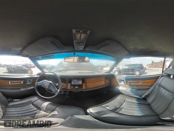 1985 Cadillac Eldorado z VIN 1G6EL578XFE640091, wystawiony jako Copart lot #71849374 z przebiegiem 30 631 mil mil oraz Szkody całkowita. Historia ofert i sprzedaży dostępna na DreamBid. Obrazek 13.