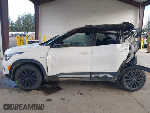 2023 Kia Seltos Nightfall with VIN KNDEUCA29P7350286, listed as a IAAI auction lot 41798975 with 1 mi miles. Bid and sale history available at carsss.com. Image 13.