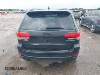 2015 Jeep Grand Cherokee Overland with VIN 1C4RJECG1FC769950, listed as a IAAI auction lot 42405712 with 217,514 mi miles and . Bid and sale history available at DreamBid. Image 16.