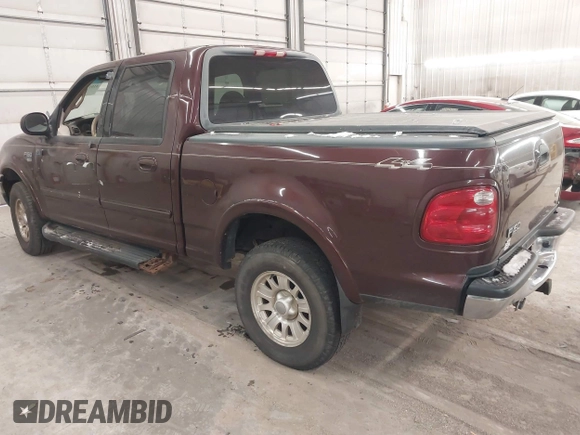 2001 Ford F-150 XLT with VIN 1FTRW08L51KE26356, listed as a IAAI auction lot 41011838 with Not provided miles and . Bid and sale history available at DreamBid. Image 3.