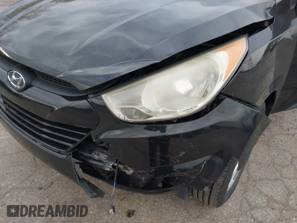 2011 Hyundai Tucson Limited with VIN KM8JUCACXBU293660, listed as a IAAI auction lot 42051931 with 99,995 mi miles and . Bid and sale history available at DreamBid. Image 6.