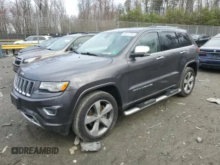 2015 Jeep Grand Cherokee Overland with VIN 1C4RJFCG0FC848046, listed as a Copart auction lot 49514795 with 212,688 mi miles and Clean title. Bid and sale history available at DreamBid. Image 1.