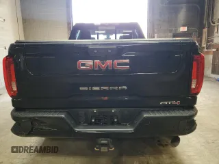 2020 GMC Sierra 2500HD AT4 z VIN 1GT49PEY7LF135671, wystawiony jako Copart lot #55740405 z przebiegiem 80 382 mil mil oraz Szkody całkowita. Historia ofert i sprzedaży dostępna na DreamBid. Obrazek 6.