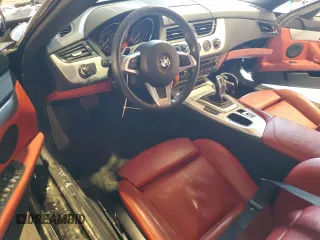 2015 BMW Z4 sDrive35i with VIN WBALM7C52FJ799104, listed as a Copart auction lot 88354535 with 56,560 mi miles and Salvage Title. Bid and sale history available at carsss.com. Image 8.