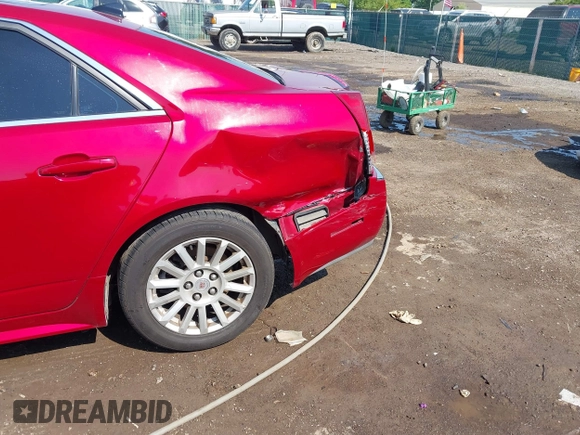 2011 Cadillac CTS Luxury with VIN 1G6DG5EY9B0146136, listed as a IAAI auction lot 42463083 with 182,324 mi miles and . Bid and sale history available at DreamBid. Image 6.