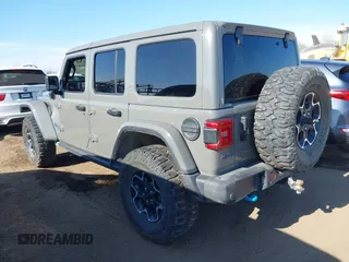 2022 Jeep Wrangler Unlimited Rubicon with VIN 1C4JJXR61NW160832, listed as a IAAI auction lot 39421092 with 32,347 mi miles and . Bid and sale history available at DreamBid. Image 3.