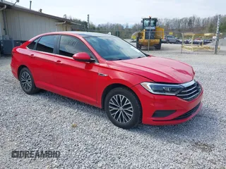 2019 Volkswagen Jetta SEL z VIN 3VWEB7BU6KM167274, wystawiony jako IAAI lot #41964191 z przebiegiem 104 003 mil mil oraz . Historia ofert i sprzedaży dostępna na DreamBid. Obrazek 1.