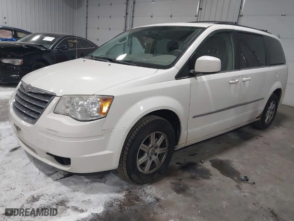 2010 Chrysler Town & Country Touring with VIN 2A4RR5D15AR114946, listed as a IAAI auction lot 42001471 with 222,299 mi miles. Bid and sale history available at carsss.com. Image 2.