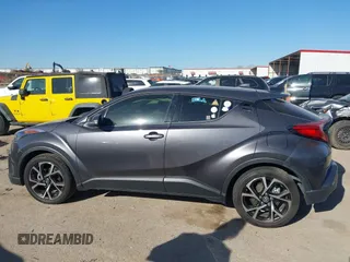 2019 Toyota C-HR XLE with VIN JTNKHMBX1K1062180, listed as a IAAI auction lot 41769979 with 75,159 mi miles. Bid and sale history available at carsss.com. Image 14.