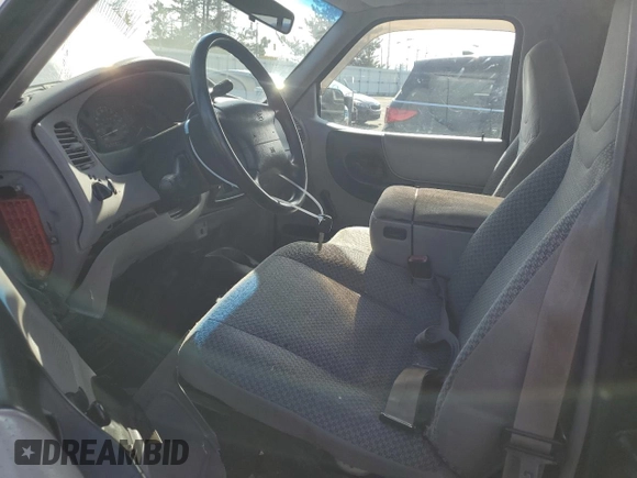 1999 Ford Ranger XL with VIN 1FTYR10V9XUB87056, listed as a Copart auction lot 43989795 with 193,980 mi miles and Salvage Title. Bid and sale history available at carsss.com. Image 7.