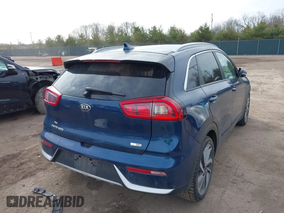 2018 Kia Niro Touring with VIN KNDCE3LC6J5174472, listed as a IAAI auction lot 41824400 with 83,182 mi miles. Bid and sale history available at carsss.com. Image 4.