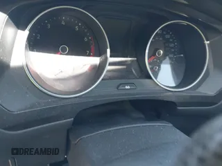 2018 Volkswagen Tiguan S z VIN 3VV1B7AX5JM043090, wystawiony jako IAAI lot #41998165 z przebiegiem Nie podano mil oraz . Historia ofert i sprzedaży dostępna na DreamBid. Obrazek 7.